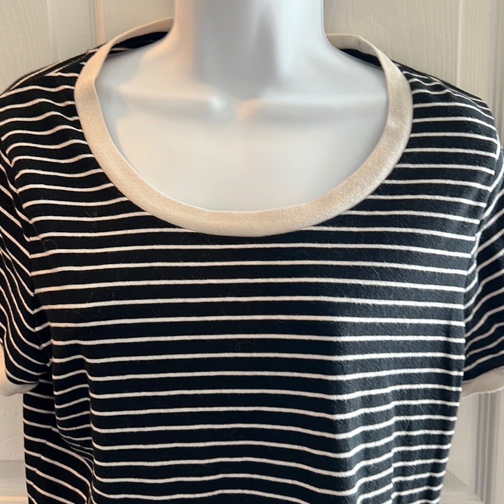 Black and cream colored striped shirt
